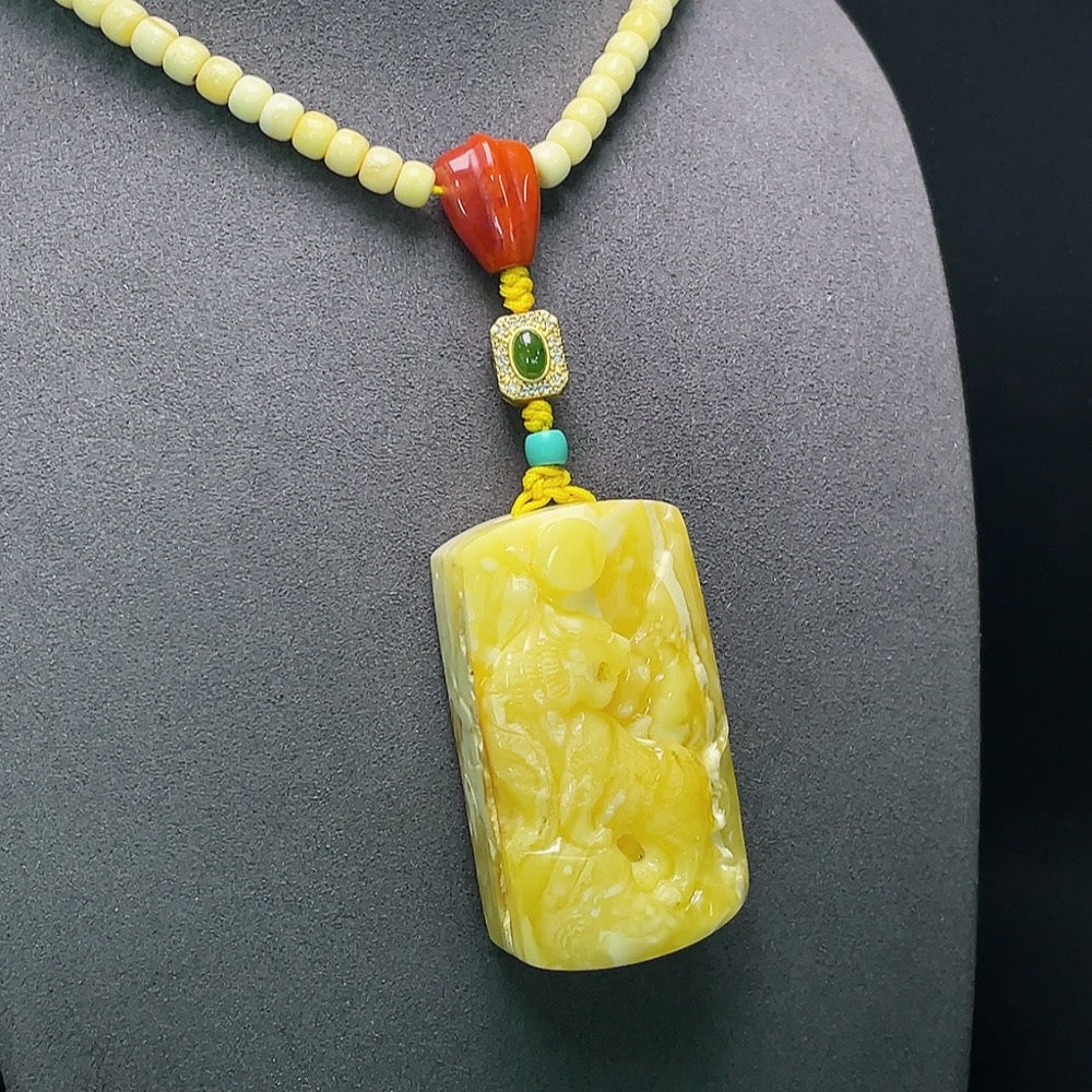 Amber beeswax pendant with non-natural accent stones and chain, crafted by HUILIU HQ, certified amber jewelry.