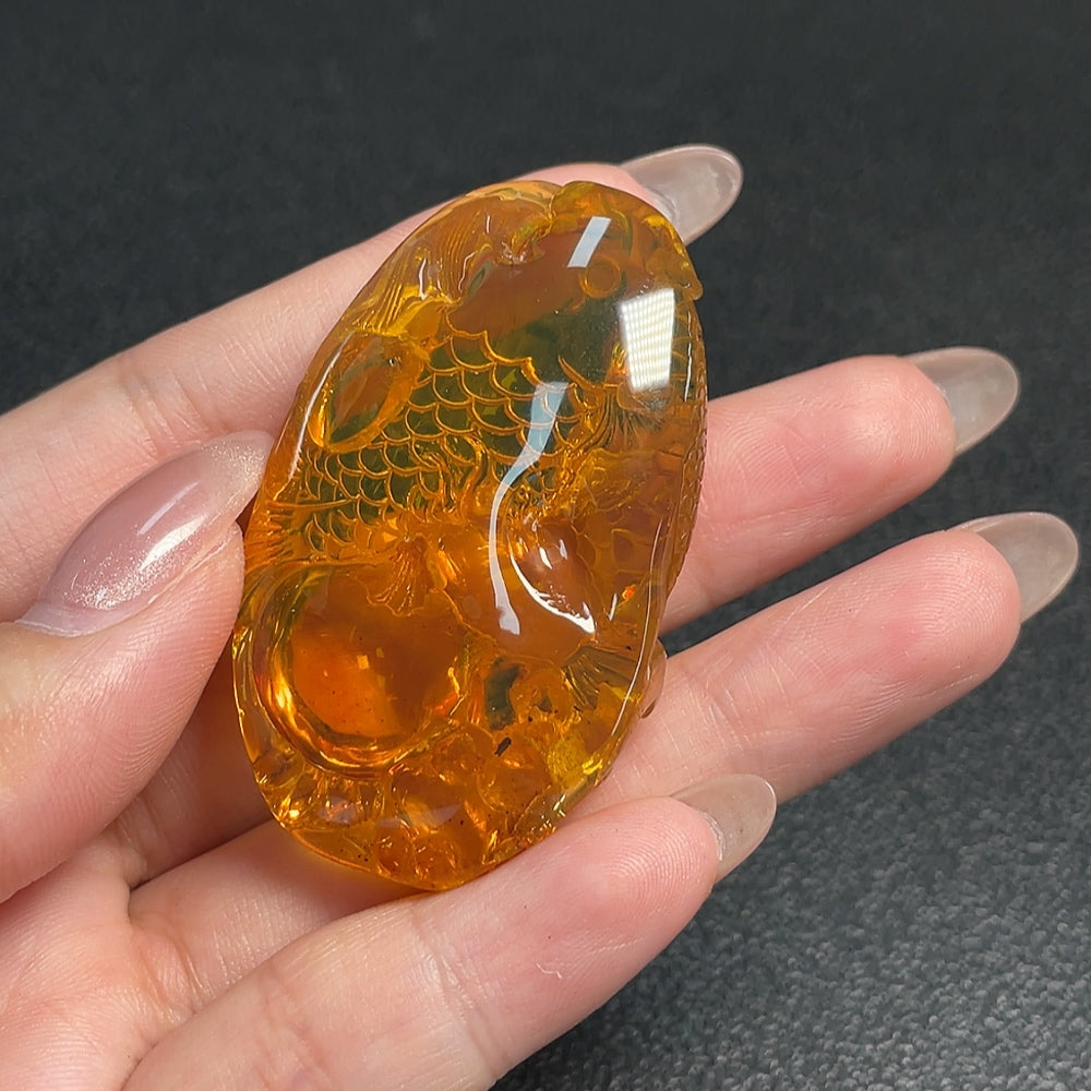 Huiliu Certified Amber Honey Wax Pendant featuring warm amber tones and intricate natural resin details.