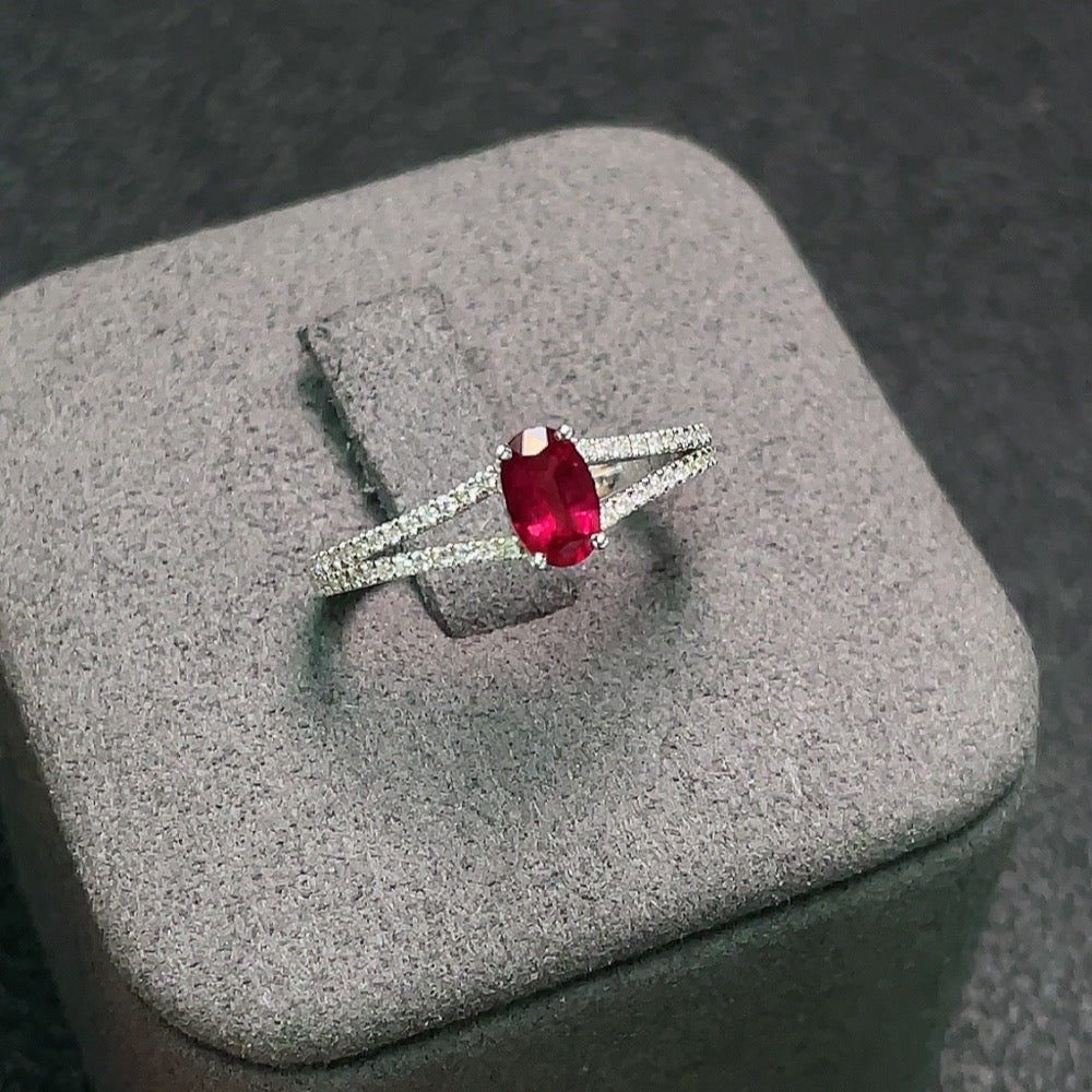 HUILIU HQ 18K ruby ring with diamond accents, size 12, featuring a 5.9x3.2mm ruby gemstone and sparkling diamond details.