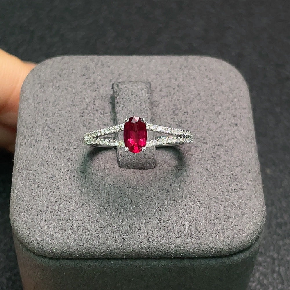 18K ruby ring with diamond accents, size 12, featuring a 5.9x3.2mm gemstone, crafted by HUILIU HQ.