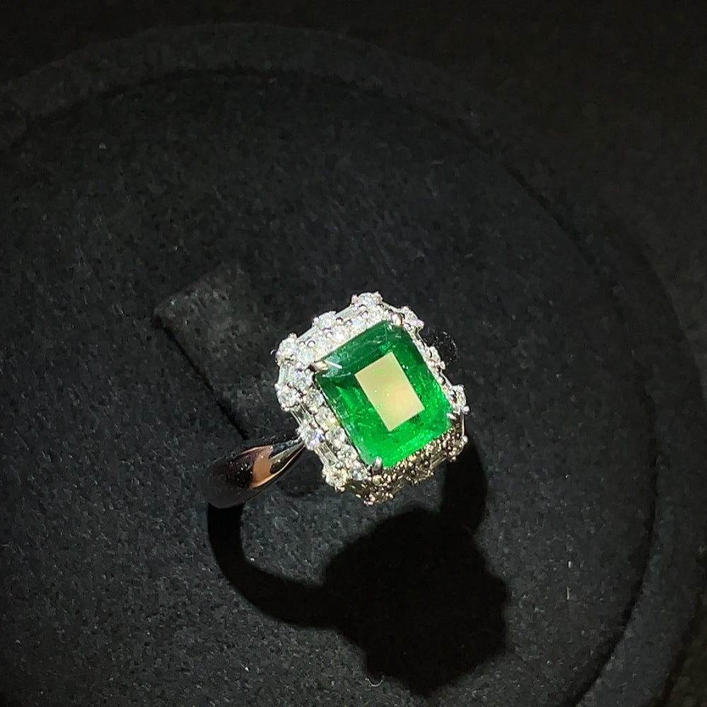 Emerald ring by HUILIU HQ featuring 18K gold, diamond accents, size 13, and enhanced clarity gemstone.