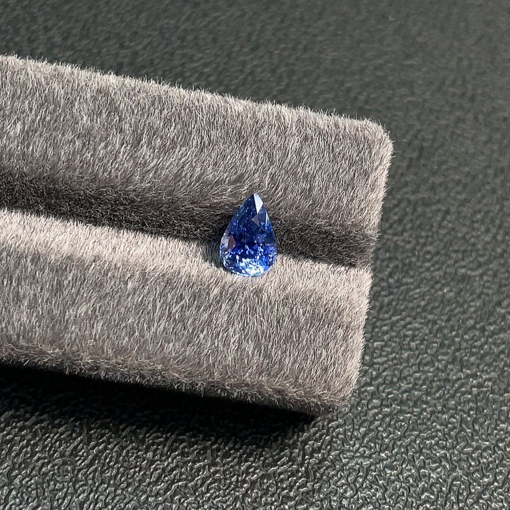 Natural Grade A Jadeite Sapphire loose gemstone from HUILIU HQ, approximately 2.01 carats, with certified quality and vibrant blue hue.