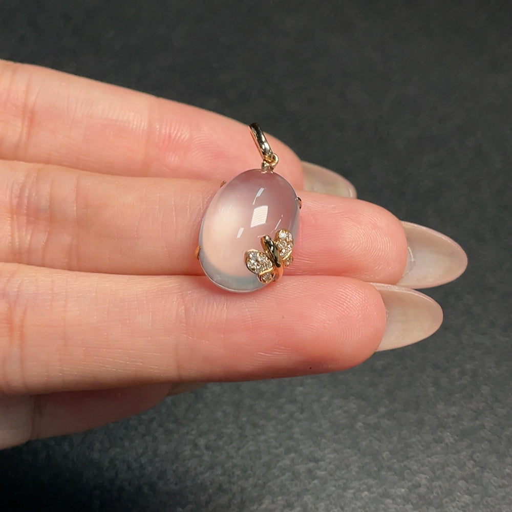 Huiliu HQ prehnite gemstone pendant with diamond accents, showcasing a polished green stone and sparkling diamond details.