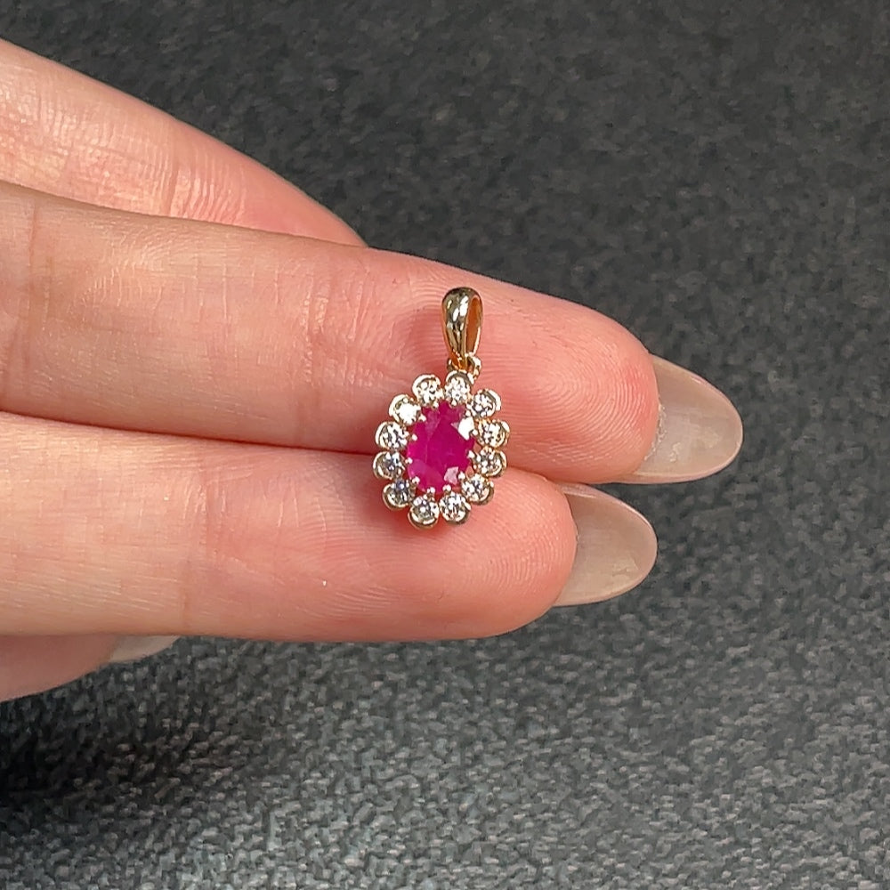 HUILIU HQ ruby pendant in 18K gold with diamond accents, showcasing a vibrant red gemstone and elegant jewelry design.
