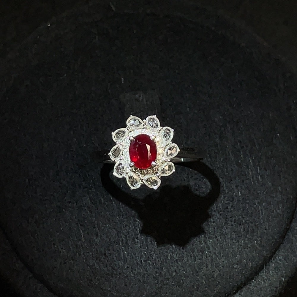 HUILIU HQ ruby ring with diamond accents in 18k gold, featuring a vibrant ruby gemstone and subtle diamond detailing.