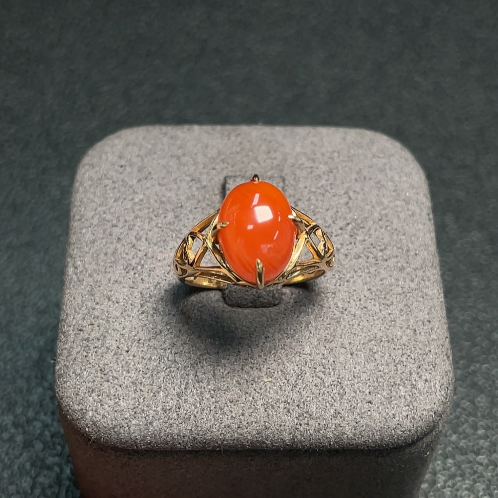 Huiliu Certified South Red Agate gemstone ring featuring a polished red agate stone set in a silver band.