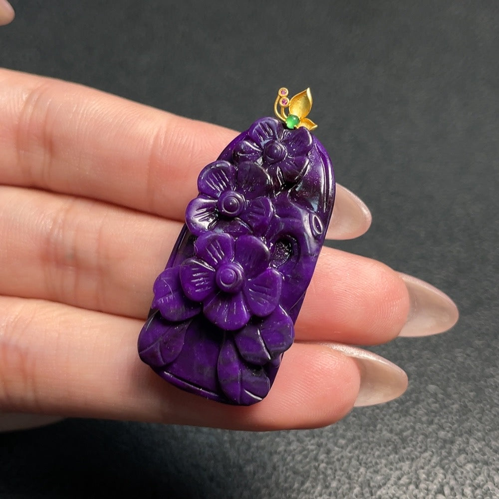 Huiliu Certified Sugilite pendant with mineral components and non-natural accent stones, featuring a polished gemstone pendant.