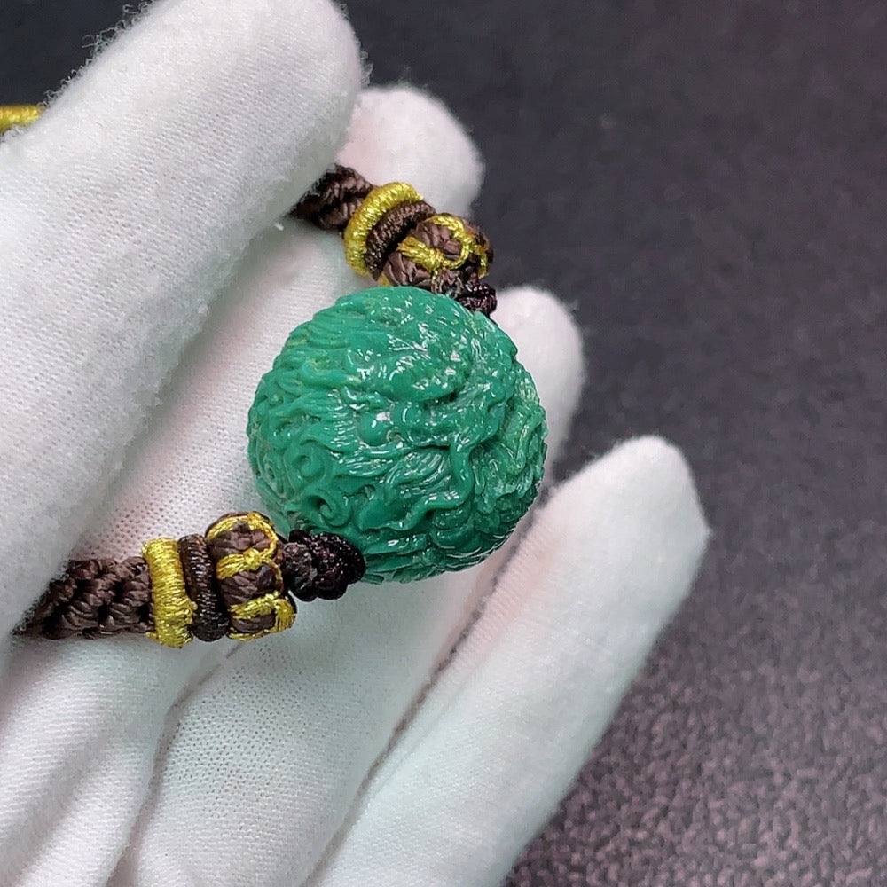 Turquoise gemstone pendant with rope, approximately 18.03g, measuring 21.3x20.4mm, crafted by HUILIU HQ.