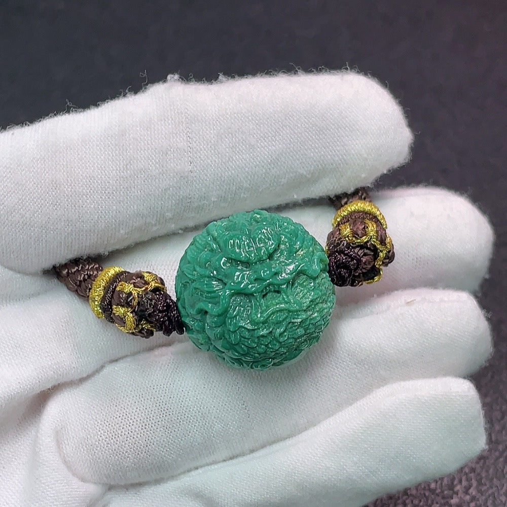 Turquoise gemstone pendant with rope, weighing approximately 18.03g, measuring about 21.3 by 20.4mm, from HUILIU HQ.