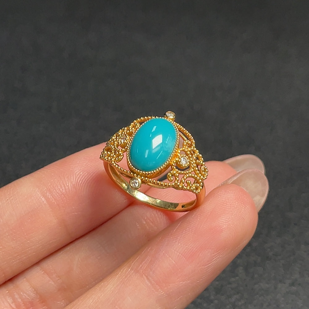 Turquoise gemstone ring with 73% gold content, size 14, weighing approximately 3.29g, by HUILIU HQ.