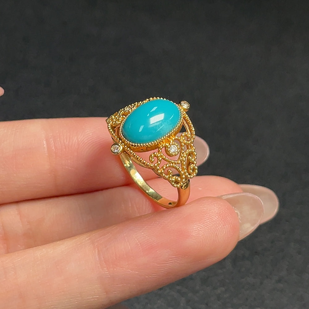 Turquoise gemstone ring by HUILIU HQ with 73% gold content, size 14, weighing approximately 3.29g, no diamonds.
