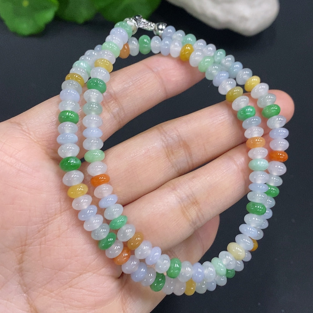 HUILIU HQ jade gemstone with a natural, undetermined color, showcasing its smooth, polished surface and rich stone texture.