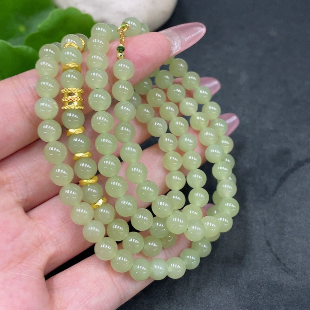 Huiliu certified Hetian Jade bead necklace with 5.7mm small beads, red content mark, unmarked surface, and small clasp.
