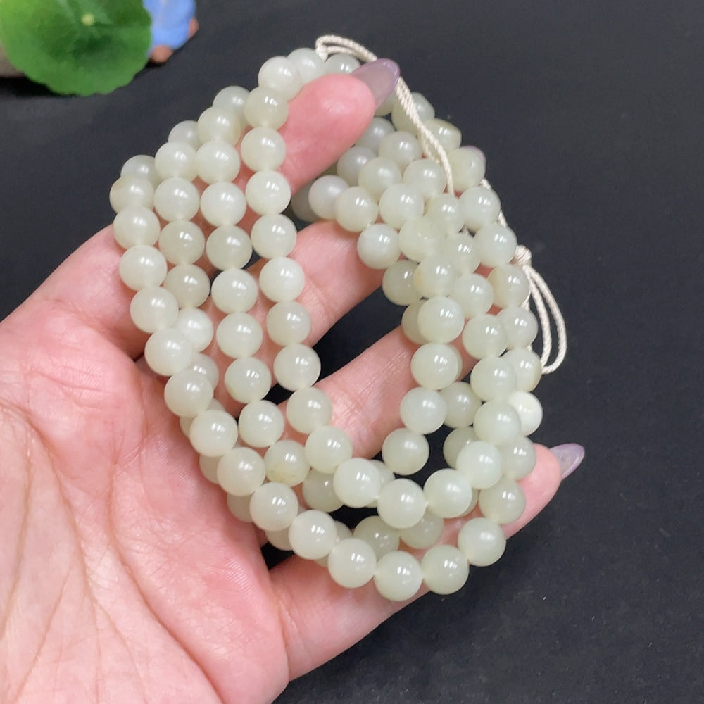 Hetian Jade bead necklace with 7.7mm beads, crafted by HUILIU HQ, weighing approximately 86g, featuring smooth, polished jade beads.