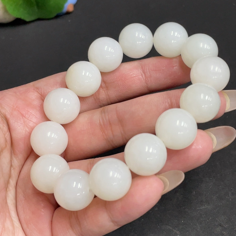Huiliu certified Hetian jade bracelet with 14.9mm round jade beads, showcasing smooth, polished jade strands.