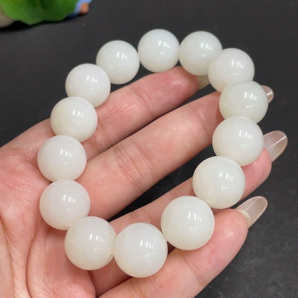 Huiliu certified Hetian Jade bracelet with 14.9mm smooth jade beads, showcasing natural green and white hues.
