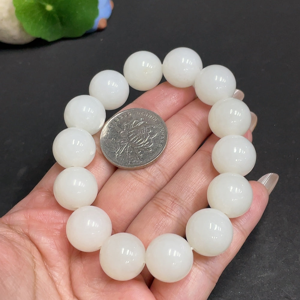 Huiliu certified Hetian jade bracelet, 14.9mm round jade beads, elegant jewelry piece showcasing smooth, polished jade stones.