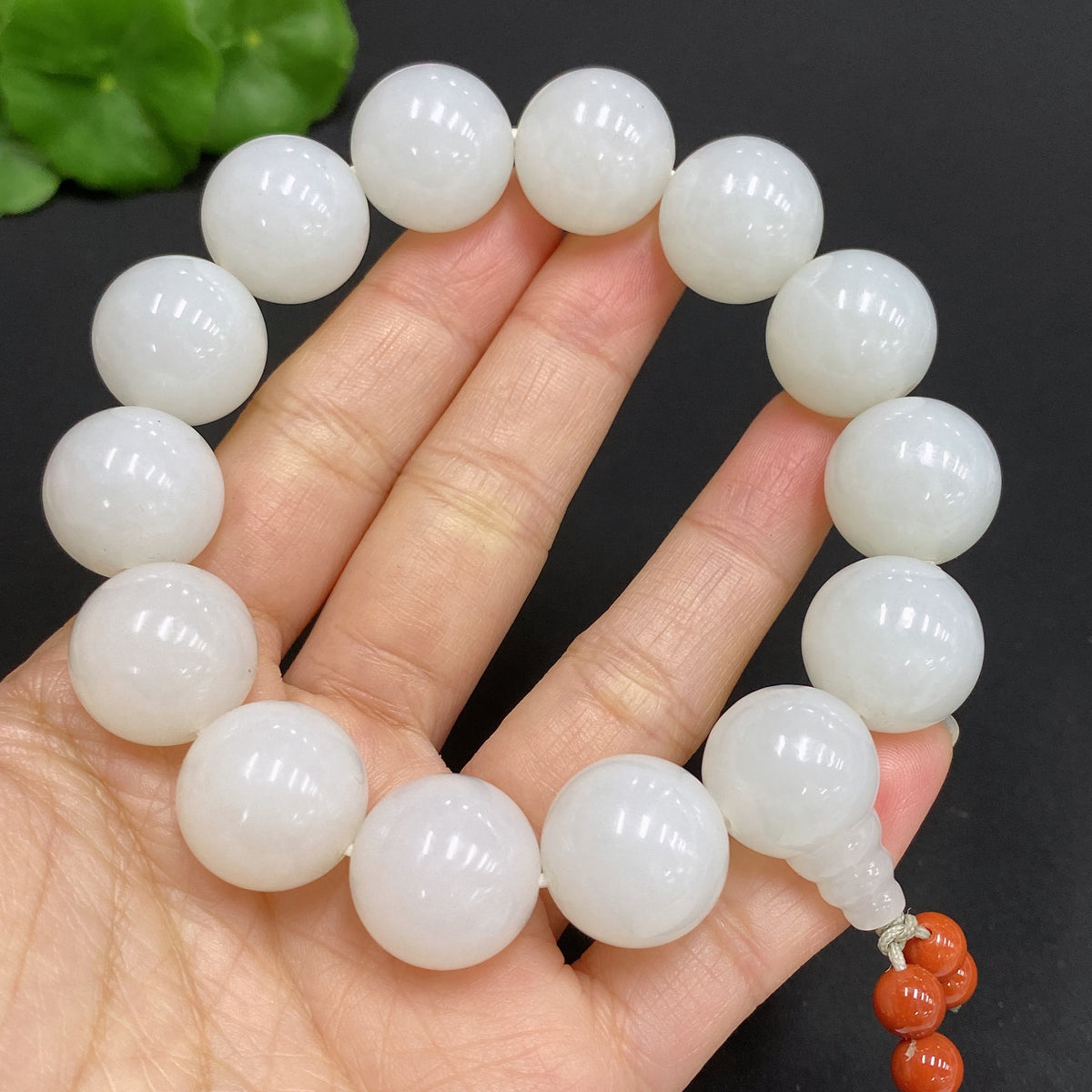 Huiliu Hetian Jade bracelet with 15.7mm beads, featuring non-Hetian jade accents, natural stone jewelry, certified by Huiliu HQ.
