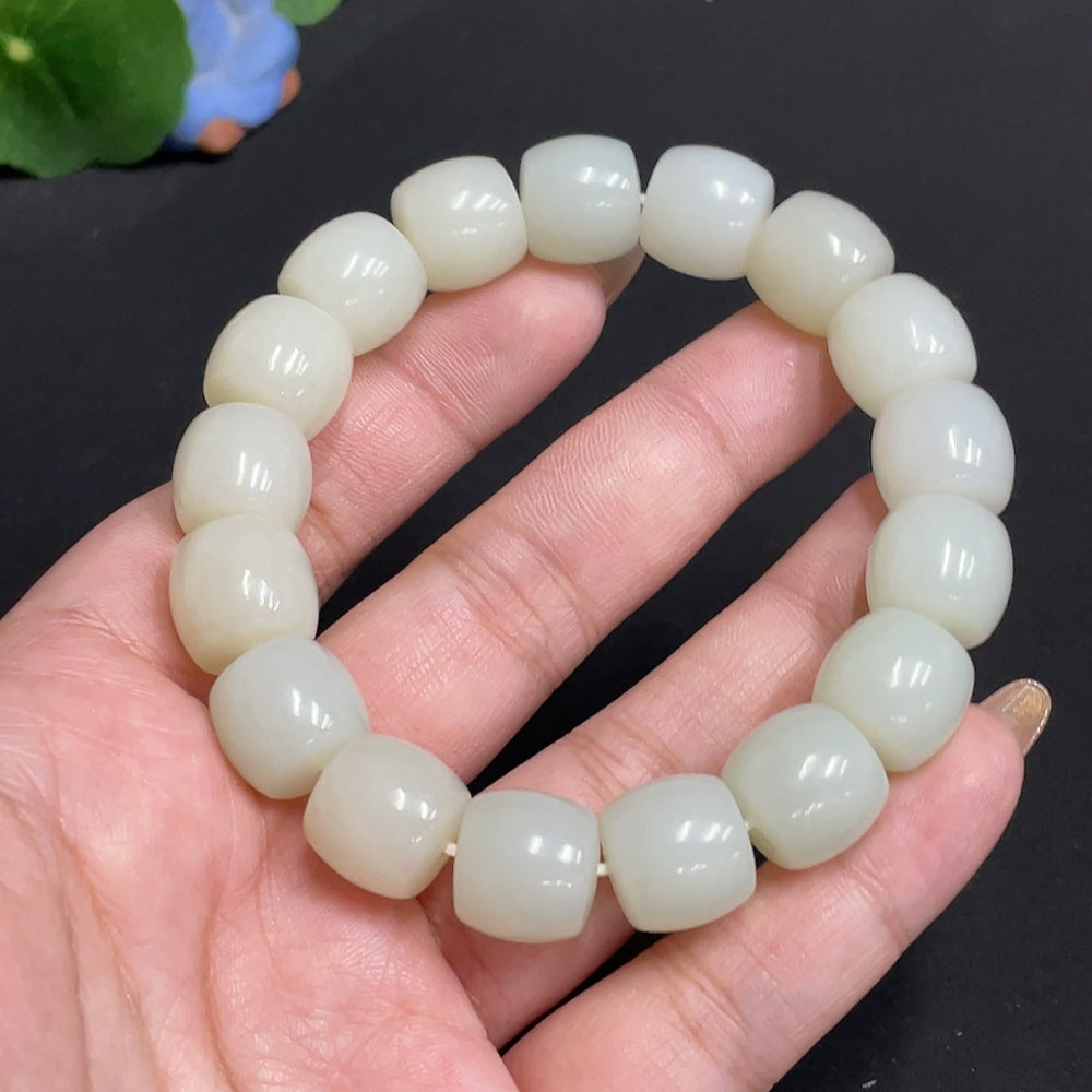 HUILIU HQ Hetian jade bracelet with 12.5mm beads and 62.9g weight, showcasing smooth, polished green jade stones.
