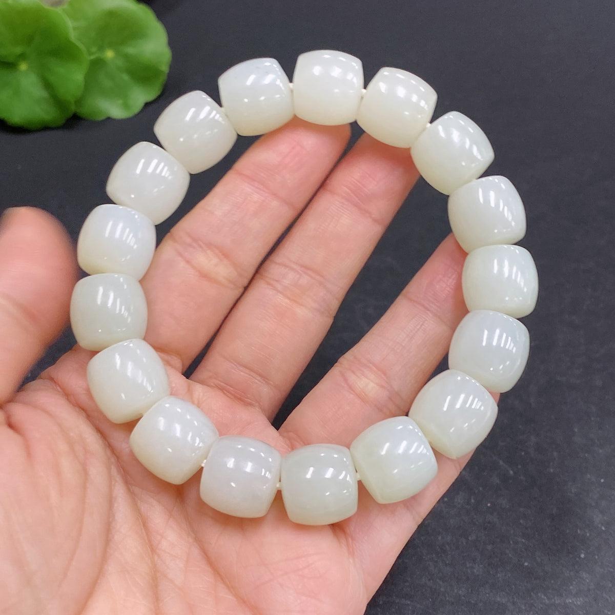 Hetian Jade bracelet by HUILIU HQ featuring 12.6mm beads and a total weight of 63.7g, showcasing smooth, polished jade stones.