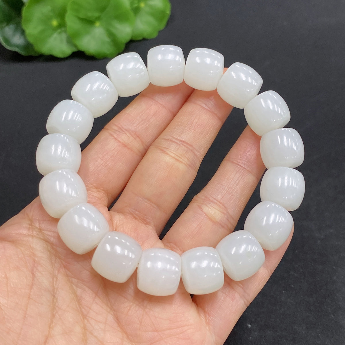 Hetian Jade bracelet by HUILIU HQ featuring 12.8mm jade beads, with a total weight of approximately 62.3g.