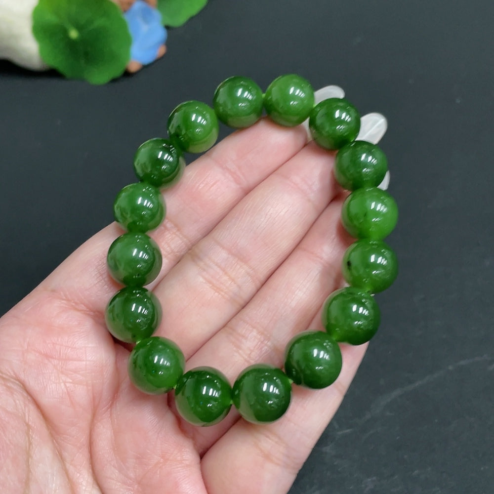 Hetian Jade bracelet by HUILIU HQ, 11.9mm size, approximately 43.9g, showcasing smooth, polished green jade beads.