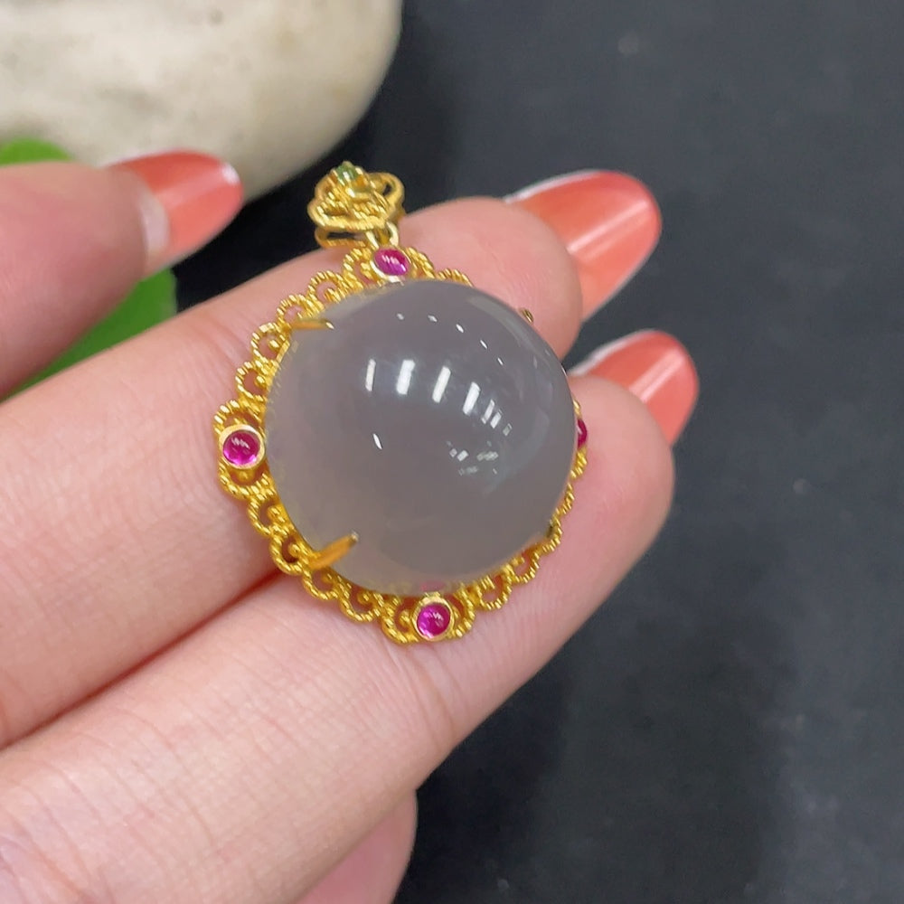 Hetian jade cabochon pendant with 18k gold setting, natural jade stone, elegant jewelry piece, approximately 5.6g weight.