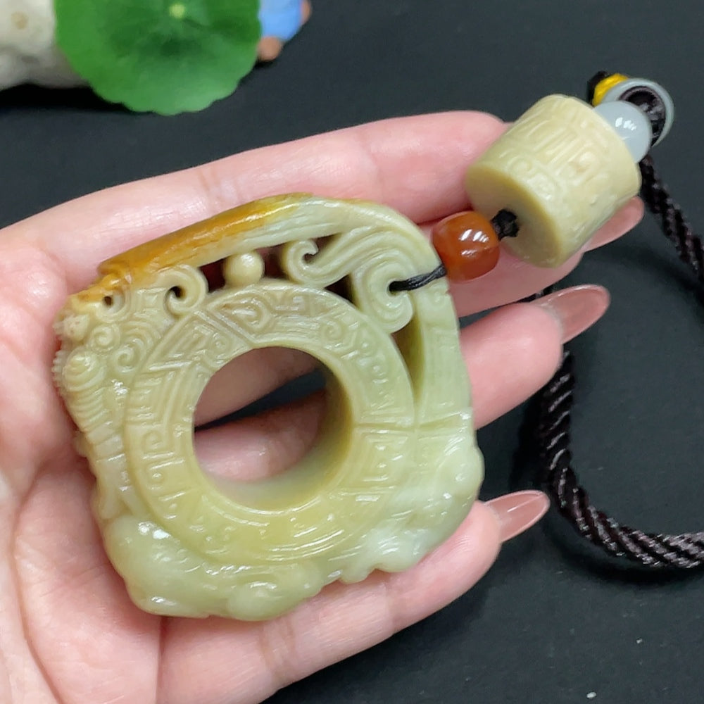 Huiliu HQ Hetian jade handheld carving in antique style, crafted from smooth, polished jade stone with intricate detailing.