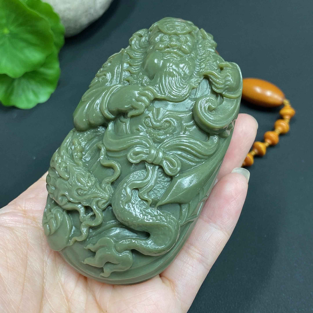 Huiliu HQ Hetian jade handheld Zhong Kui figure, Huiliu certified, detailed carved jade sculpture for display or collection.