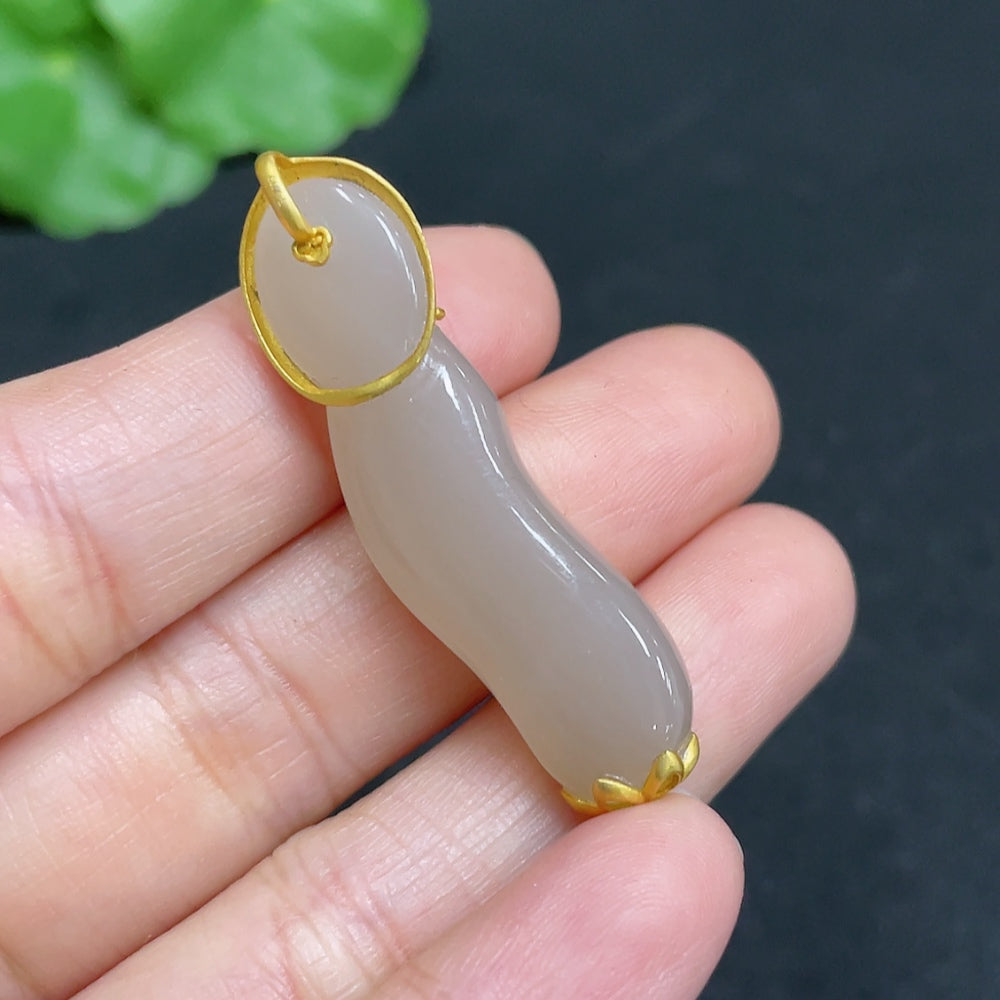 Huiliu Certified Hetian Jade Inlaid Guanyin sculpture showcasing intricate craftsmanship and smooth jade surface.