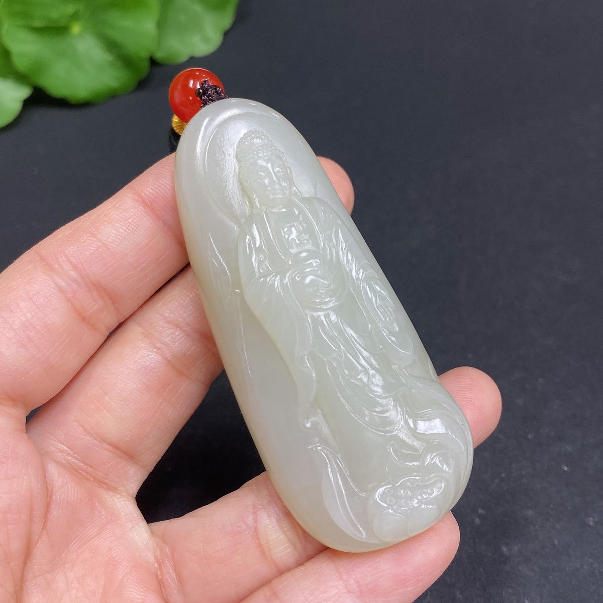 Hetian Jade pendant featuring Amitabha Buddha, crafted from green jade with detailed carvings, by HUILIU HQ.