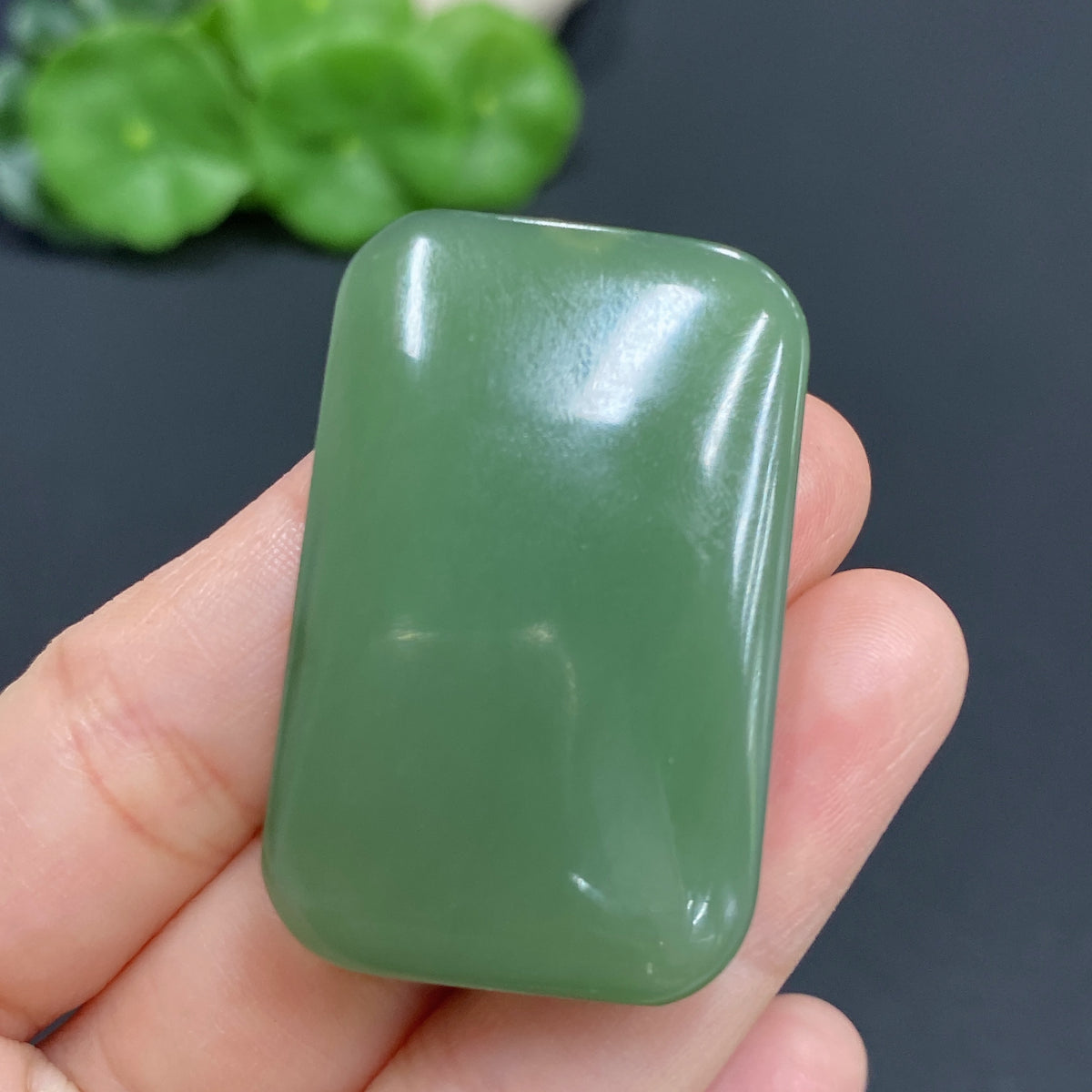 Hetian jade pendant featuring a Buddha design, weighing approximately 24.5g, crafted by HUILIU HQ.