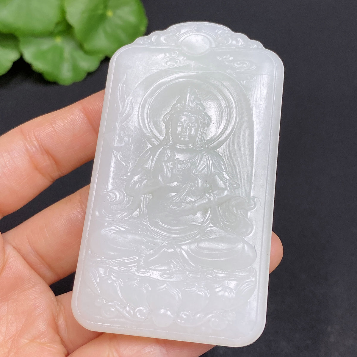Huiliu Certified Hetian Jade Pendant featuring Guanyin figure, smooth polished surface, hanging cord, intricate craftsmanship
