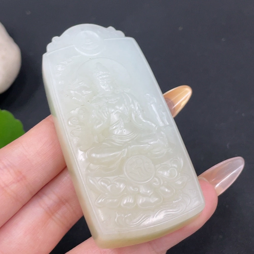 Huiliu certified Hetian jade Guanyin pendant featuring intricate carvings and smooth polished surface, showcasing traditional craftsmanship.