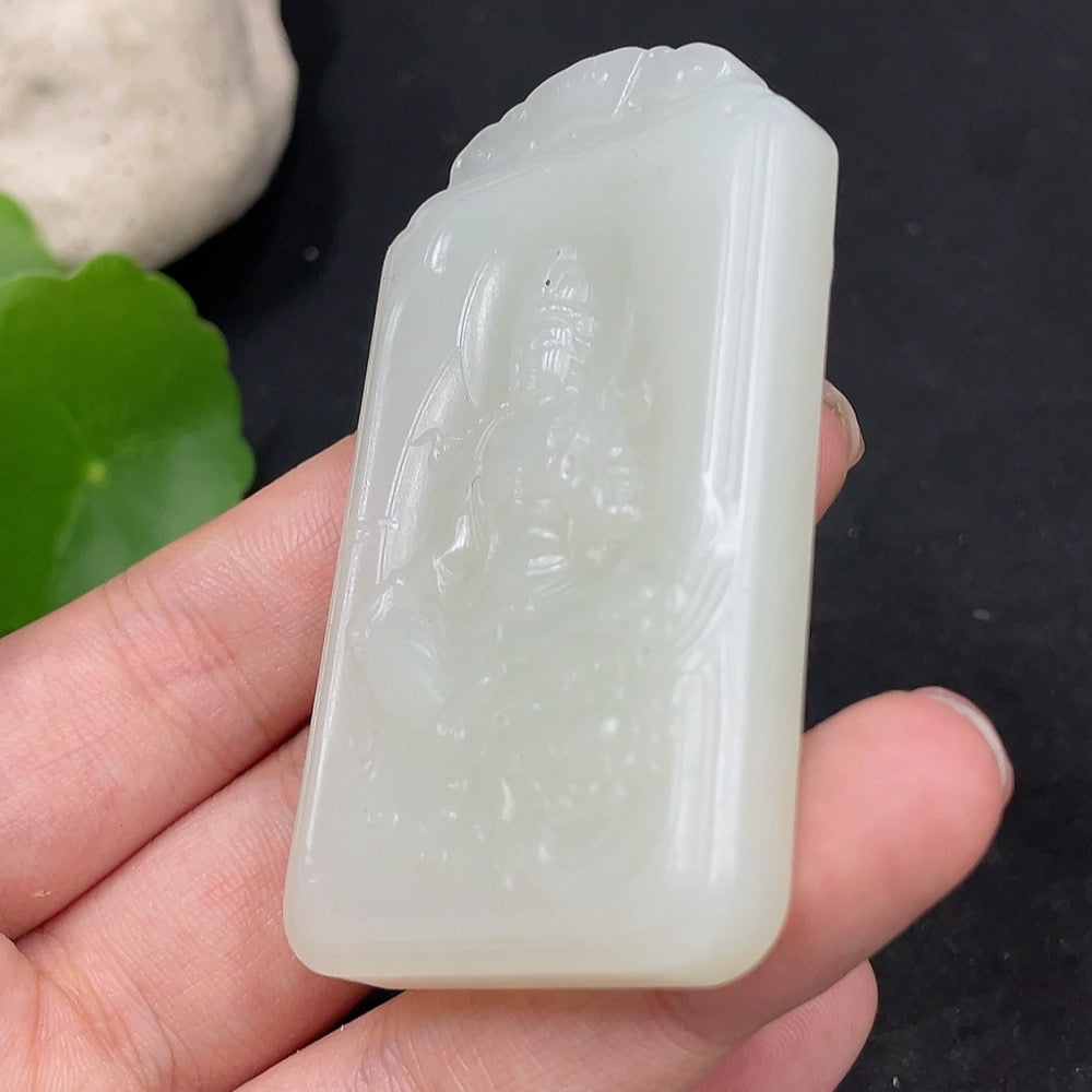 Huiliu certified Hetian jade Guanyin pendant featuring intricate carved details in smooth, polished green jade.