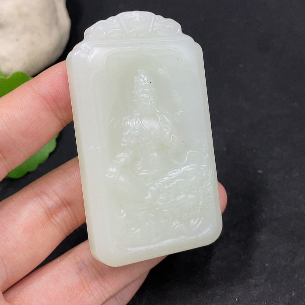 Huiliu certified Hetian jade pendant featuring Guanyin figure, smooth polished jade with intricate carved details.