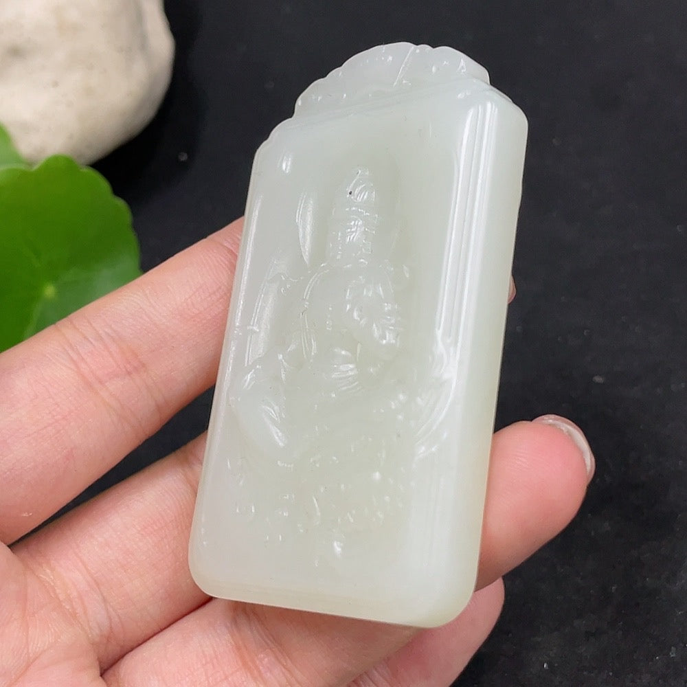 Huiliu certified Hetian jade pendant featuring Guanyin figure, smooth polished surface, and intricate carved details