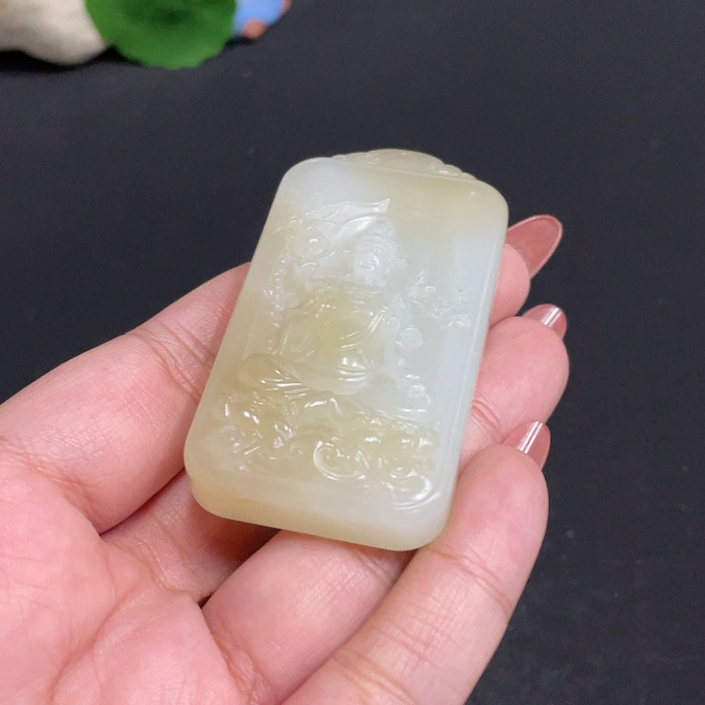 Huiliu certified Hetian jade Guanyin pendant showcasing smooth, polished jade carving of the Buddhist figure.