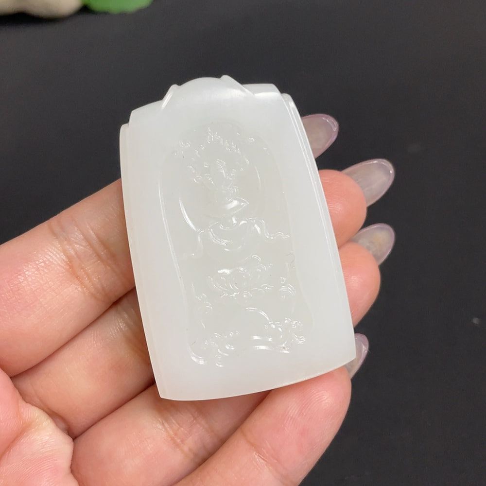 Hetian jade Guanyin pendant from HUILIU HQ, weighing about 41g, featuring detailed carved design on smooth jade surface.