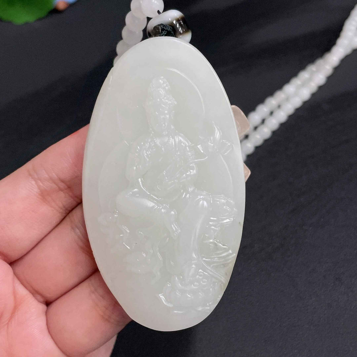 Hetian Jade Guanyin pendant with chain, handcrafted jade with undetermined skin color, weight 111g, by HUILIU HQ.