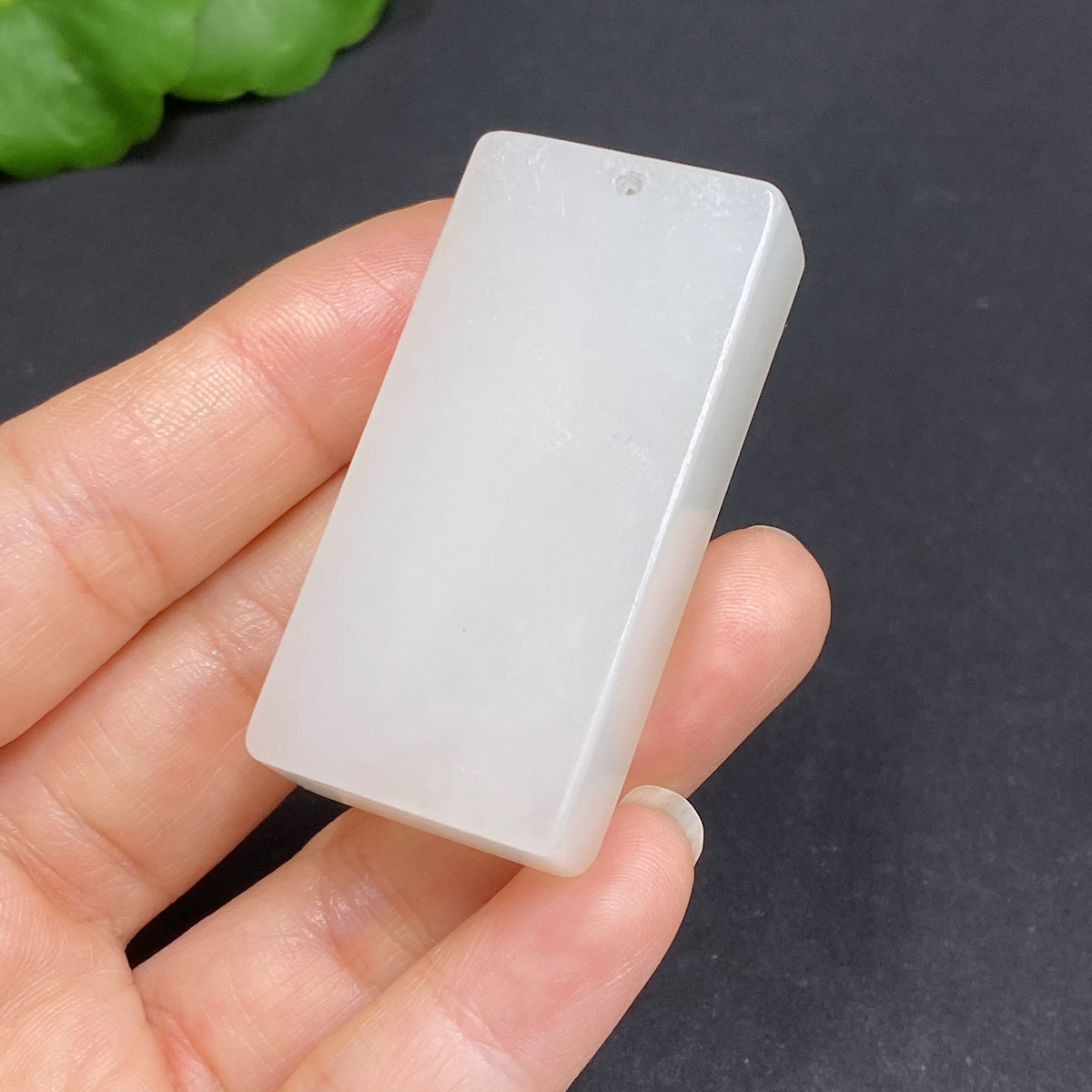 Huiliu Certified Hetian Jade Pendant, plain and smooth jade pendant with natural stone appearance, showcasing elegant craftsmanship.