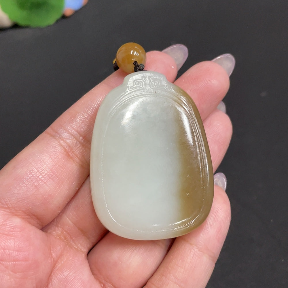Huiliu Huiliu HQ plain Hetian jade pendant, certified jade jewelry featuring smooth, polished jade stone with subtle natural variations.