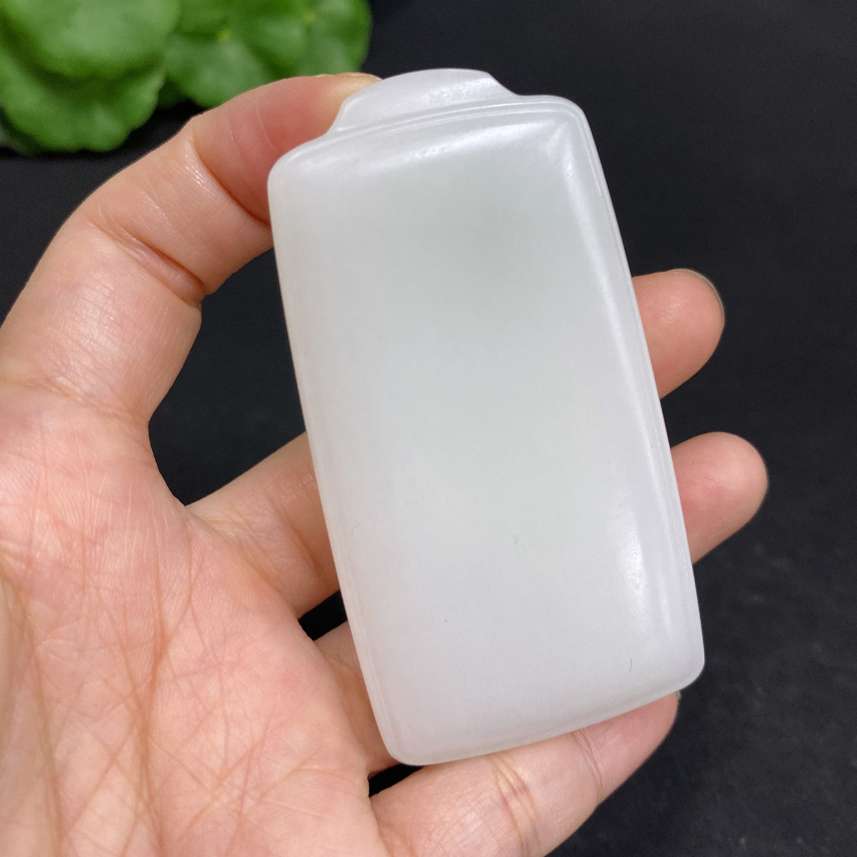 Huiliu certified Hetian jade pendant, plain and smooth, showcasing the natural white jade stone with subtle translucence.
