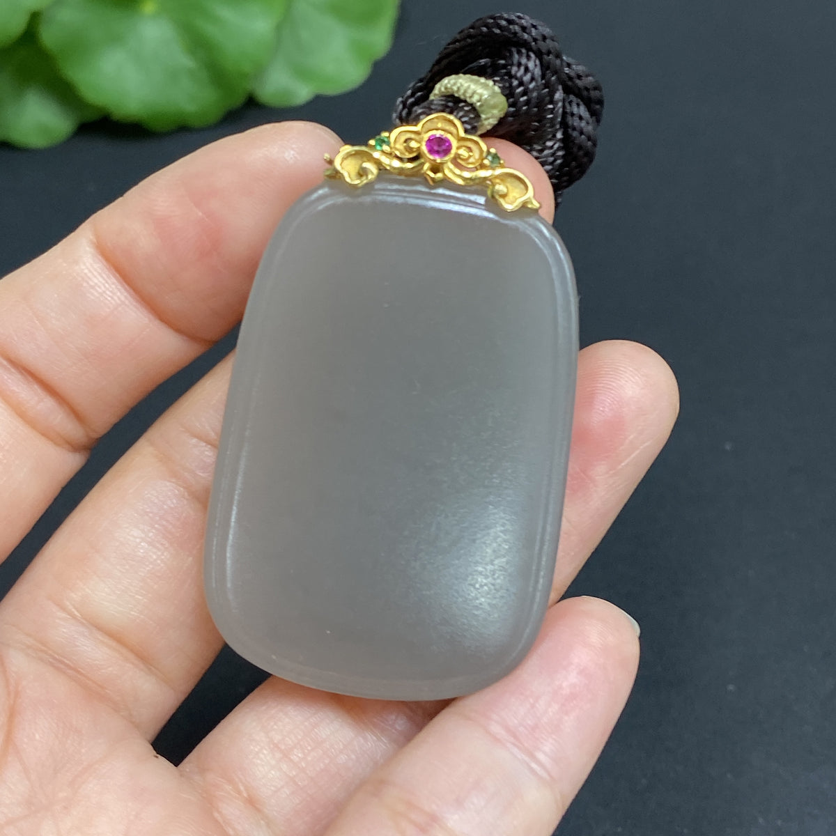 Huiliu Certified Hetian Jade Pendant with plain design, clasp, and included rope, showcasing smooth, polished jade craftsmanship.