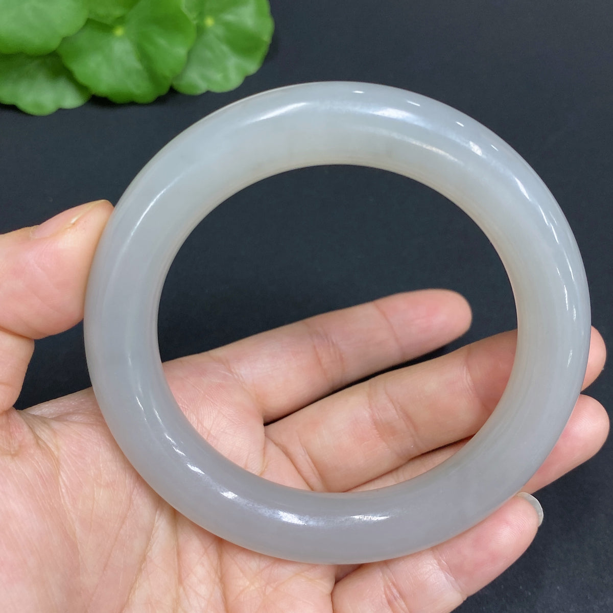 Huiliu HQ Hetian Jade round bangle, 58.3mm, natural smooth jade bracelet with Huiliu certification, showcasing a polished, elegant design.