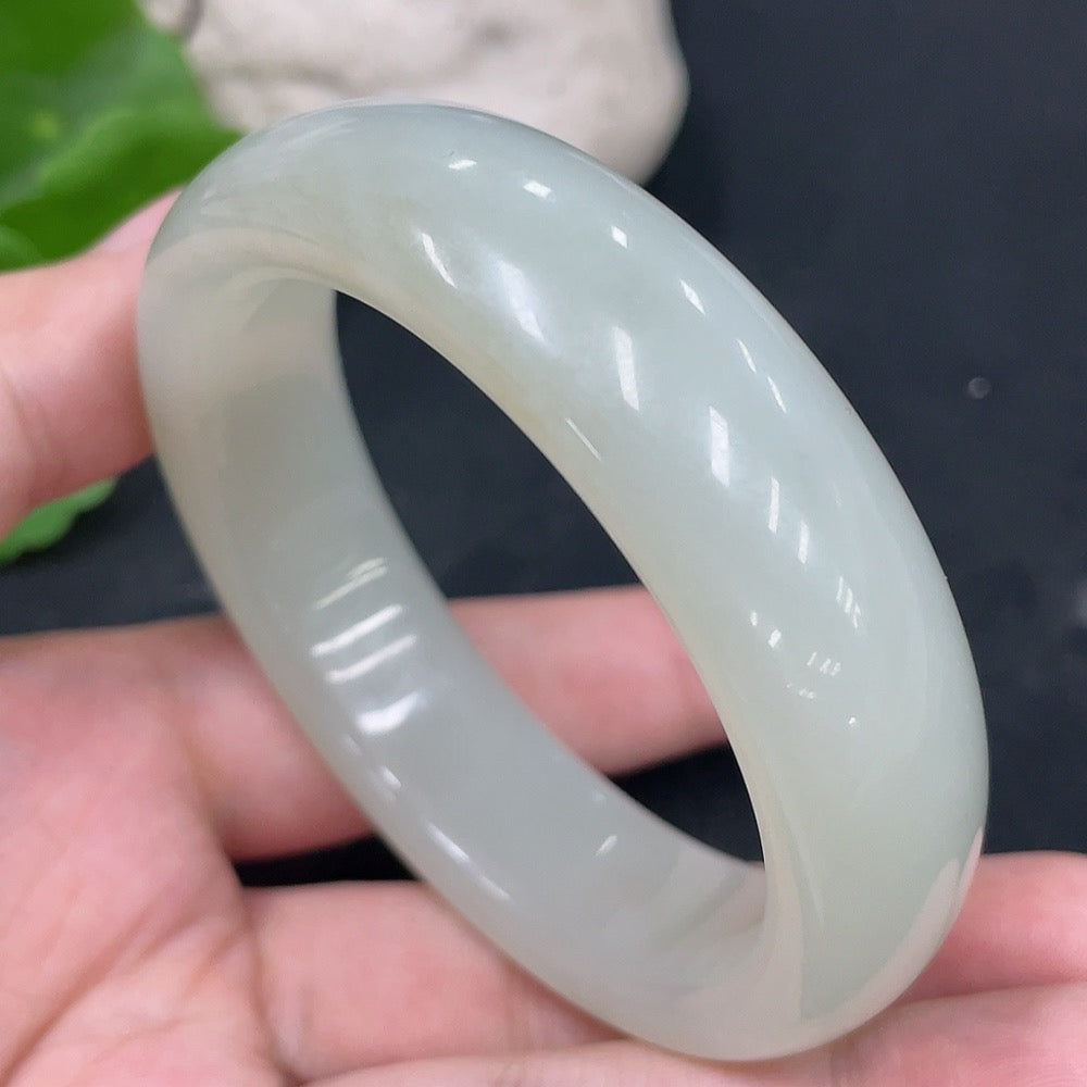 Hetian Jade round bracelet by HUILIU HQ, size 54.3mm, weighing about 64.7g, featuring smooth, polished jade beads.
