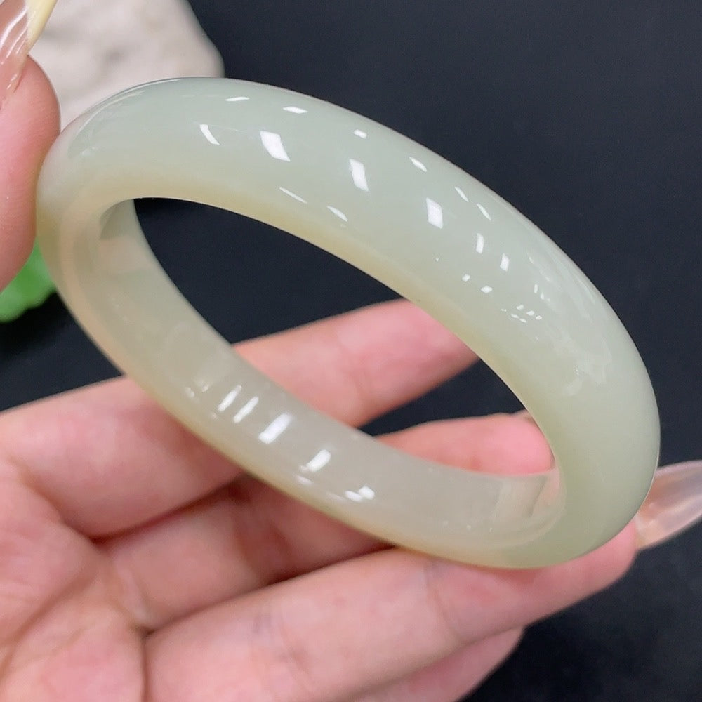 Hetian Jade round bracelet by HUILIU HQ, size 57.1, with a total weight of approximately 50.4g, showcasing smooth jade beads.