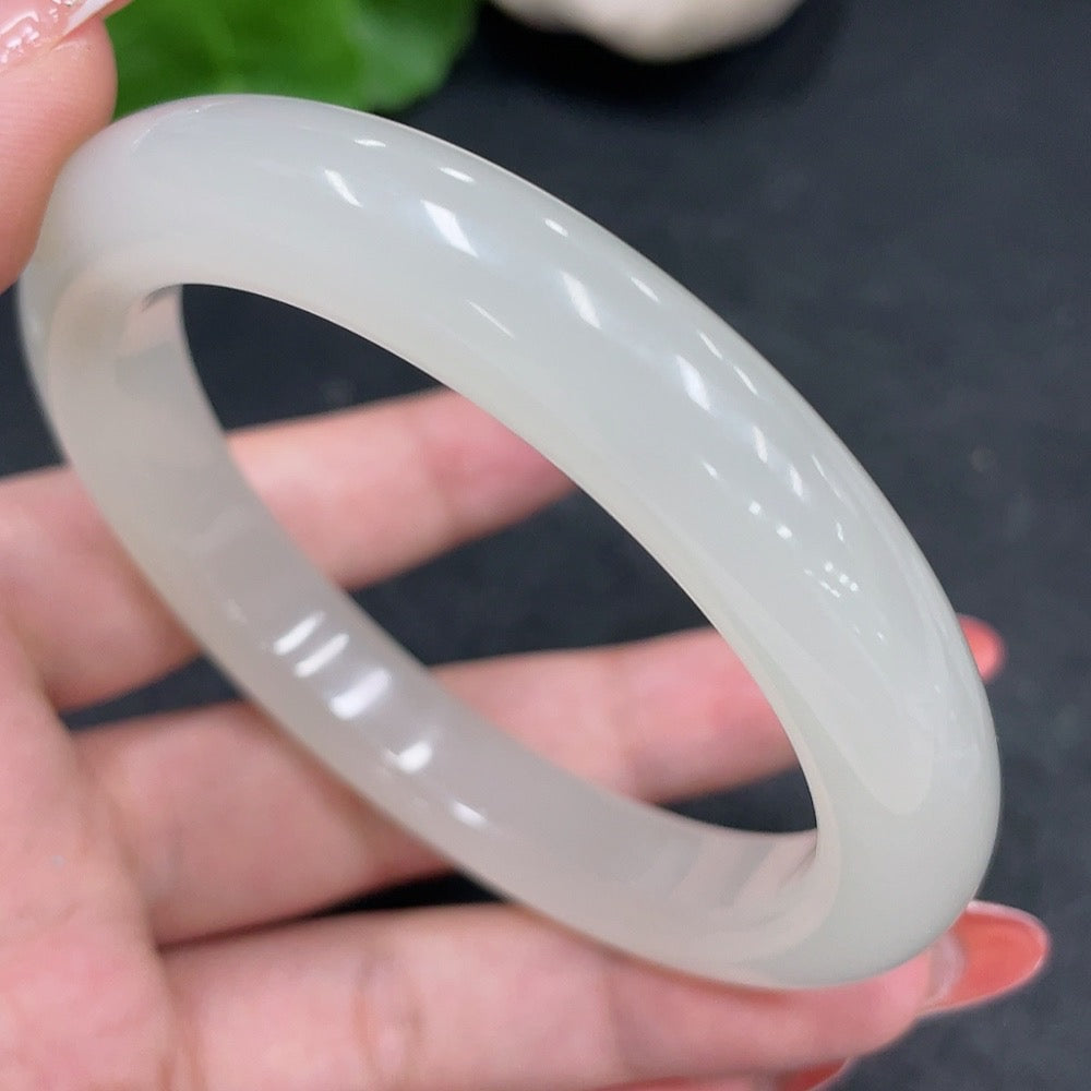 Hetian jade round bracelet by HUILIU HQ, size 59.3, weighing approximately 58.3g, showcasing smooth, polished jade beads.