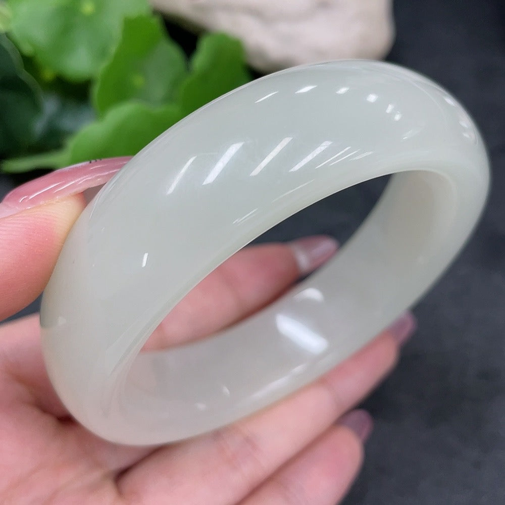 Hetian Jade round bracelet by HUILIU HQ, size 60.3 with an approximate weight of 88.4g, featuring smooth, polished jade beads.