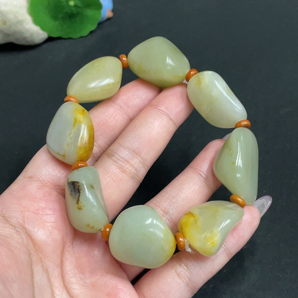 Hetian Jade Seed Material Bracelet by HUILIU HQ with undetermined skin color formation, weighing approximately 99.3g.